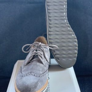 Gray lace up shoes